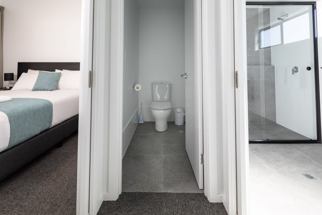 2 bed layout, looking through to bathroom and second bedroom area